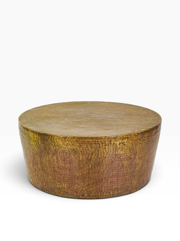 Studio A Izmir hammered brass coffee table, round drum form in antique brass, front view