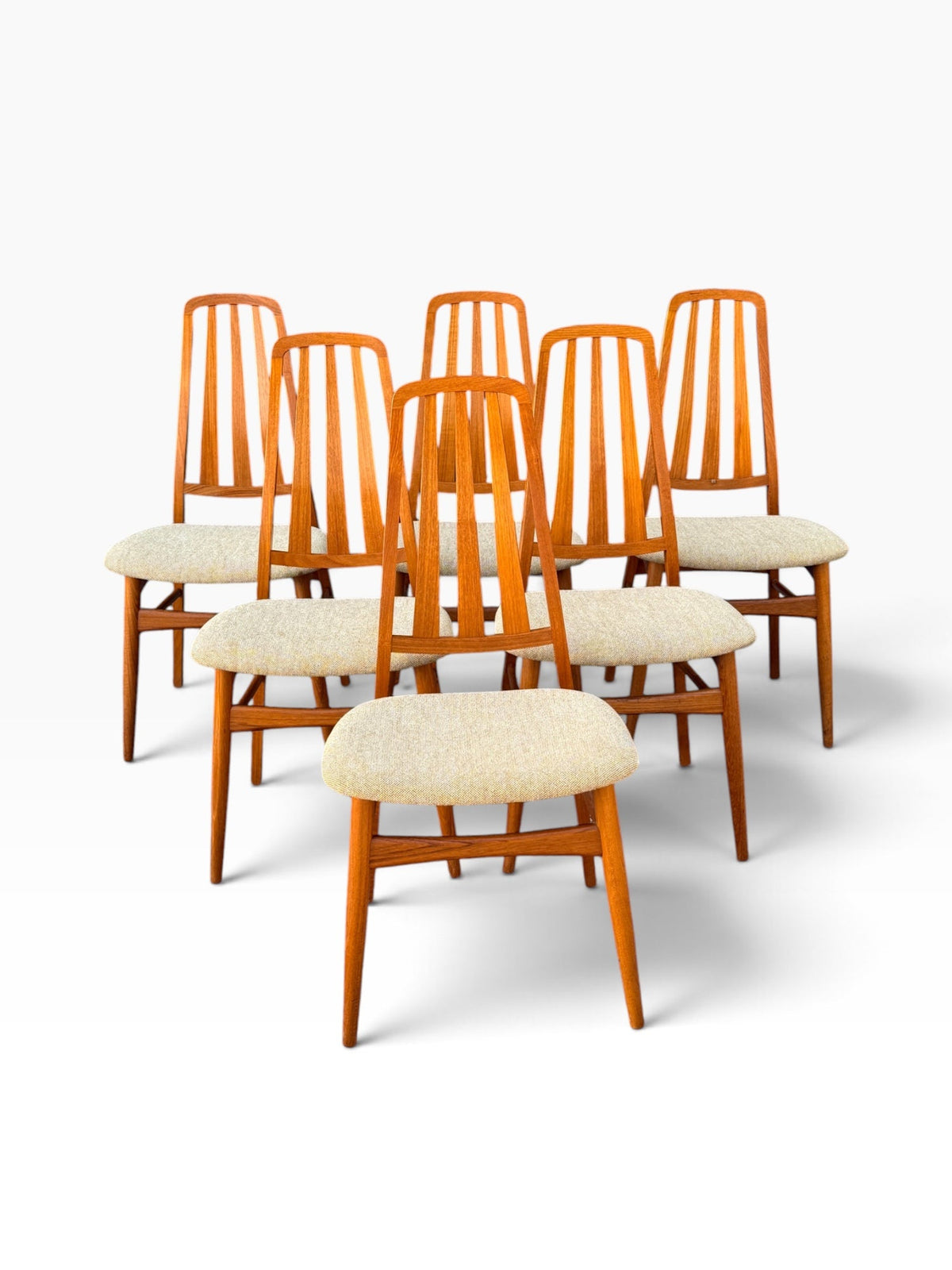 Set of six vintage Niels Koefoed Eva teak dining chairs with tall slatted backs and oatmeal wool seats