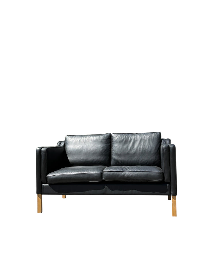 Mid-Century Modern Black Leather Sofa – Two Seater image 1