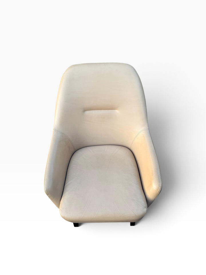 Cream leather lounge chair seat from above