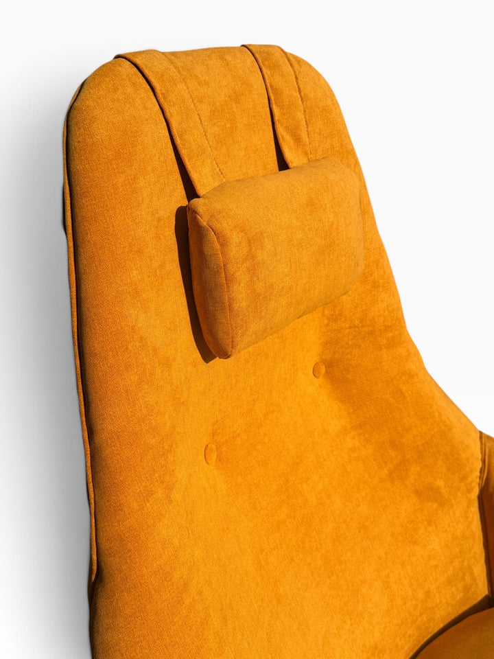 Adjustable headrest pillow on high-back lounge chair