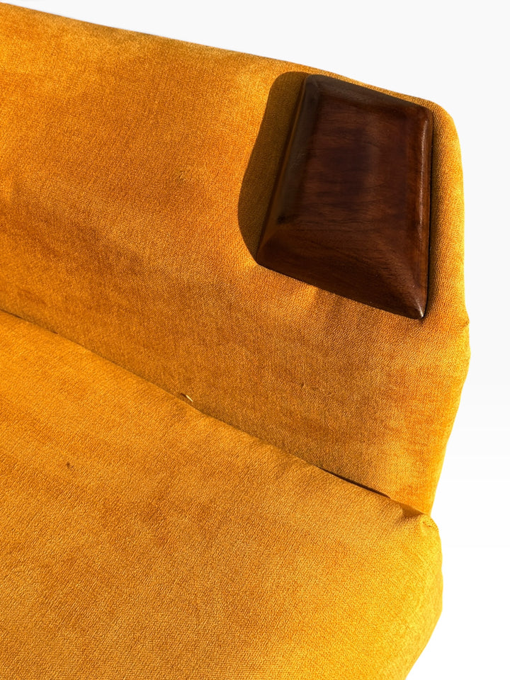 Walnut arm cap and new yellow upholstery close-up