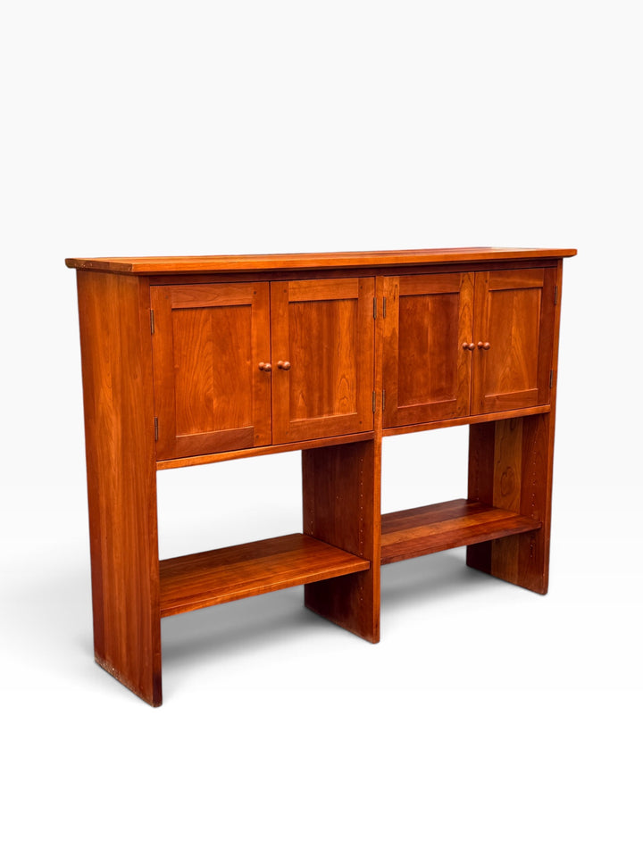 Cherry sideboard console table, three-quarter angle view