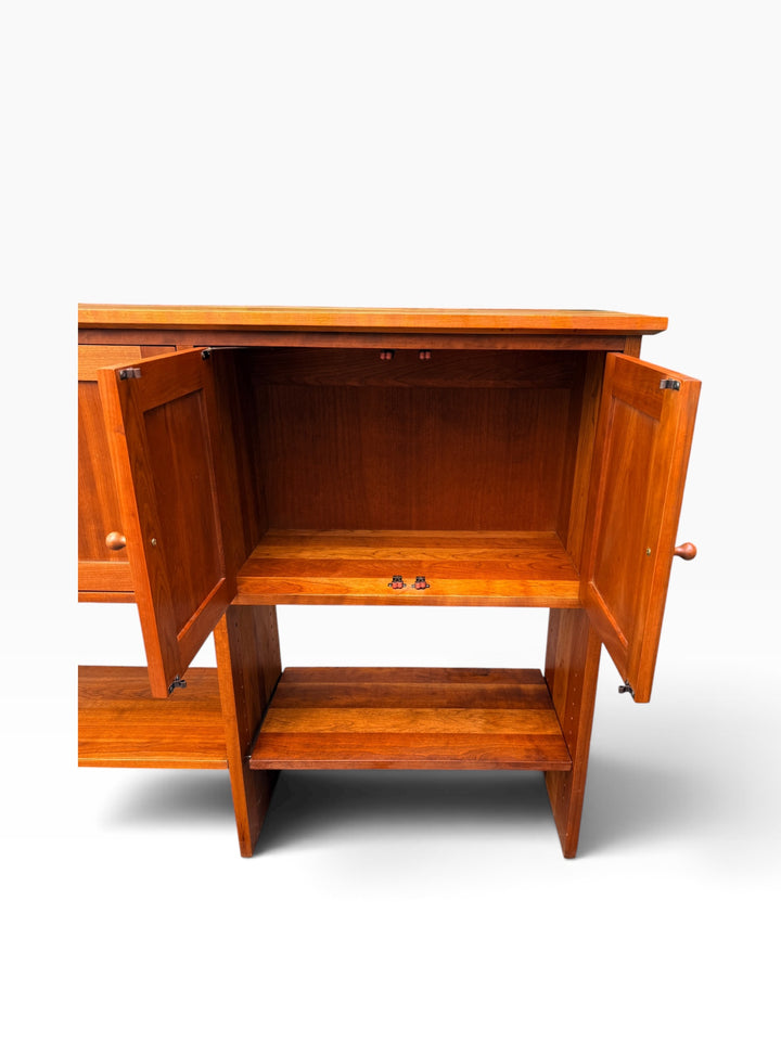 Right cabinet bay open with adjustable shelf