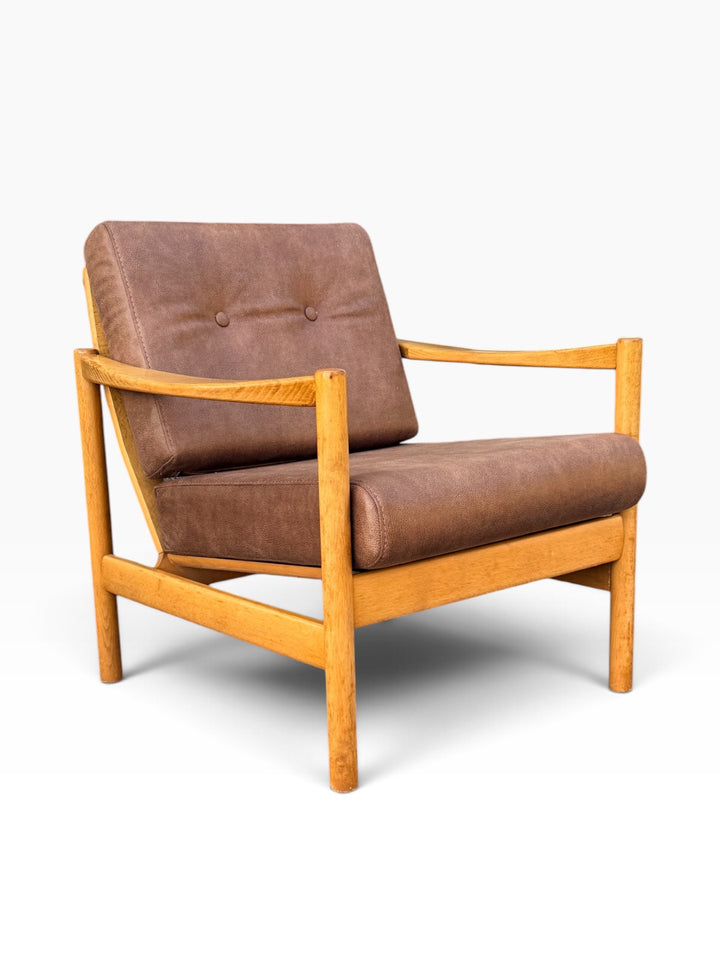 Brown leather Danish lounge chair, three-quarter view