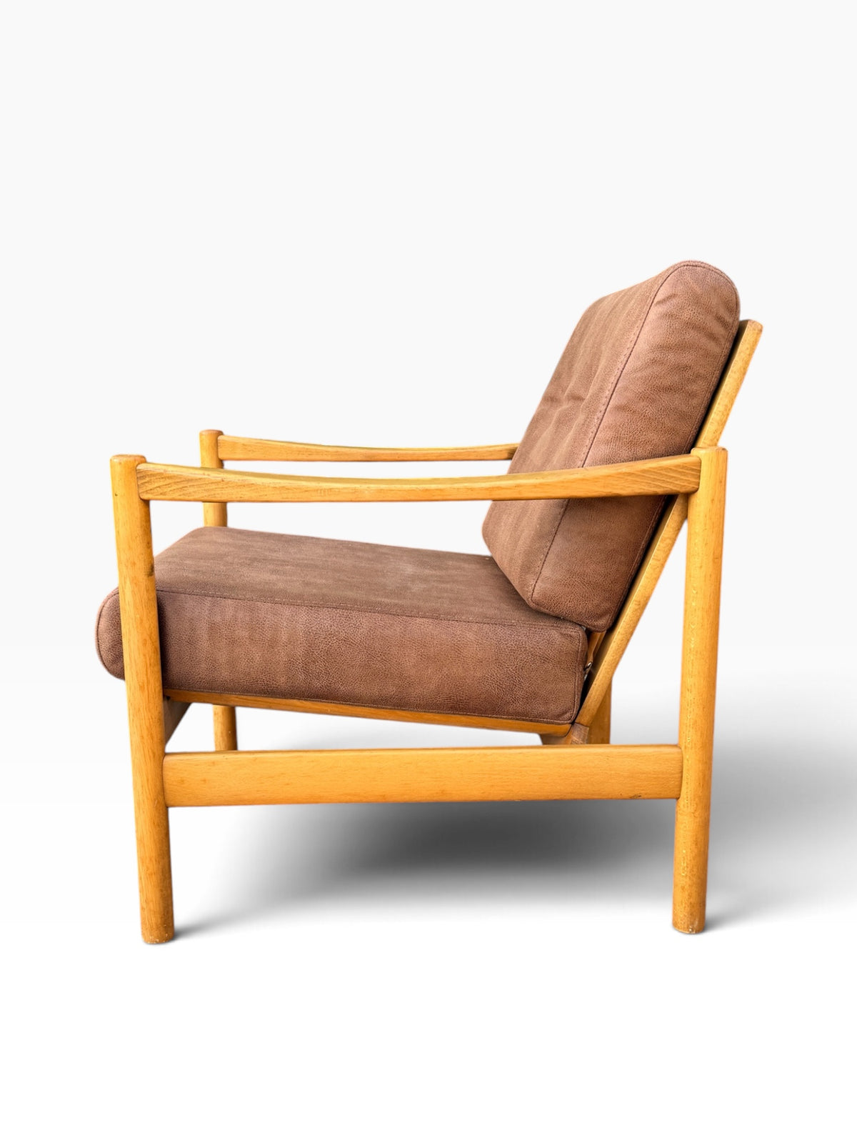 Opposite side profile of Danish leather lounge chair