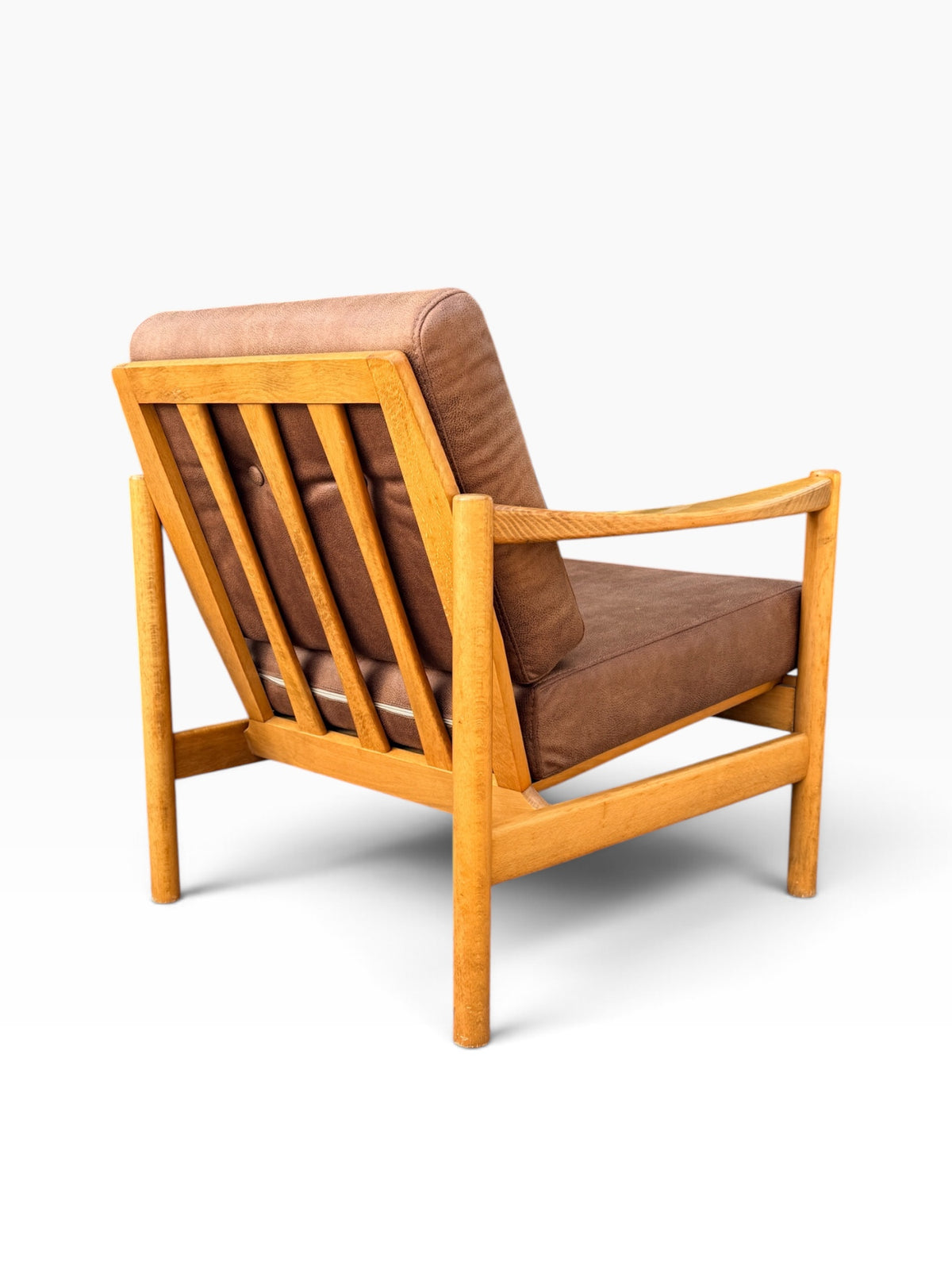 Rear three-quarter view showing slatted back frame