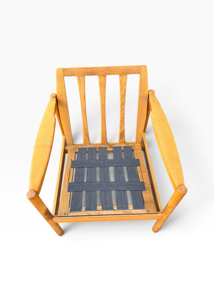 Frame without cushions showing rubber webbing