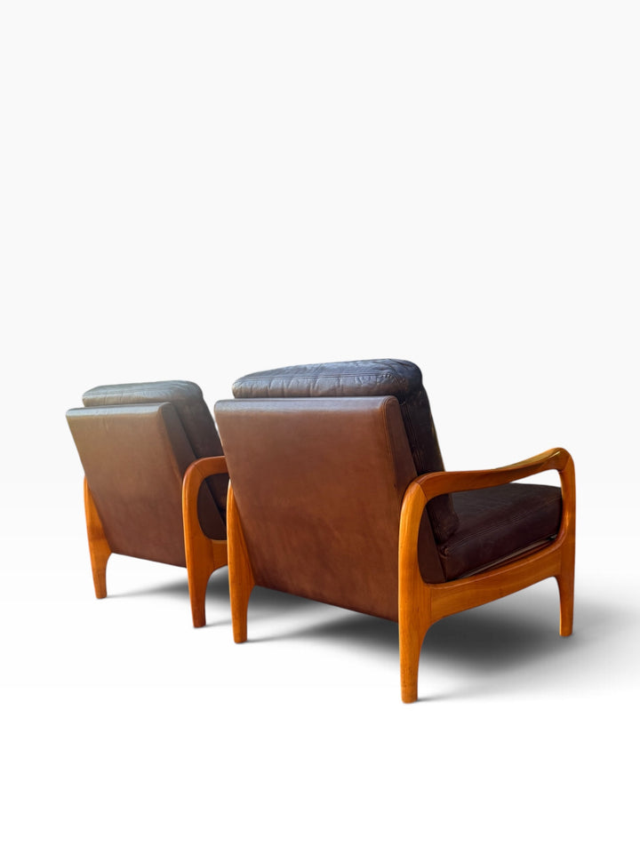 Rear view of pair of Danish modern leather chairs