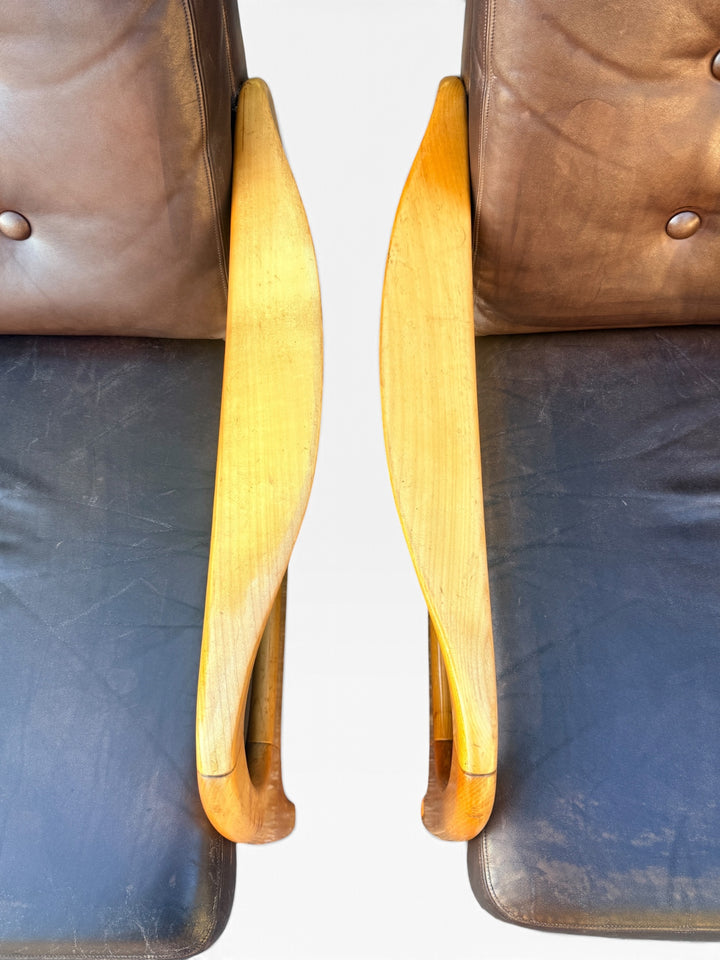 Detail of sculpted maple arm ends