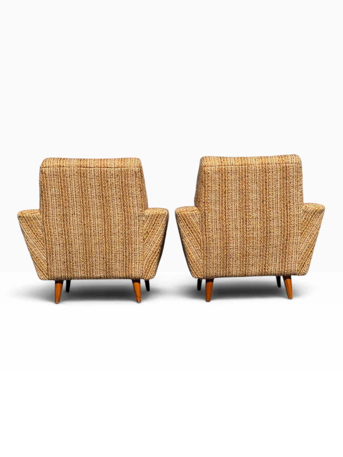 Pair of mid-century lounge chairs, back view