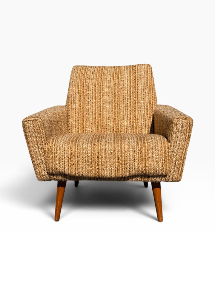 Single Danish modern lounge chair, front view of seat and back