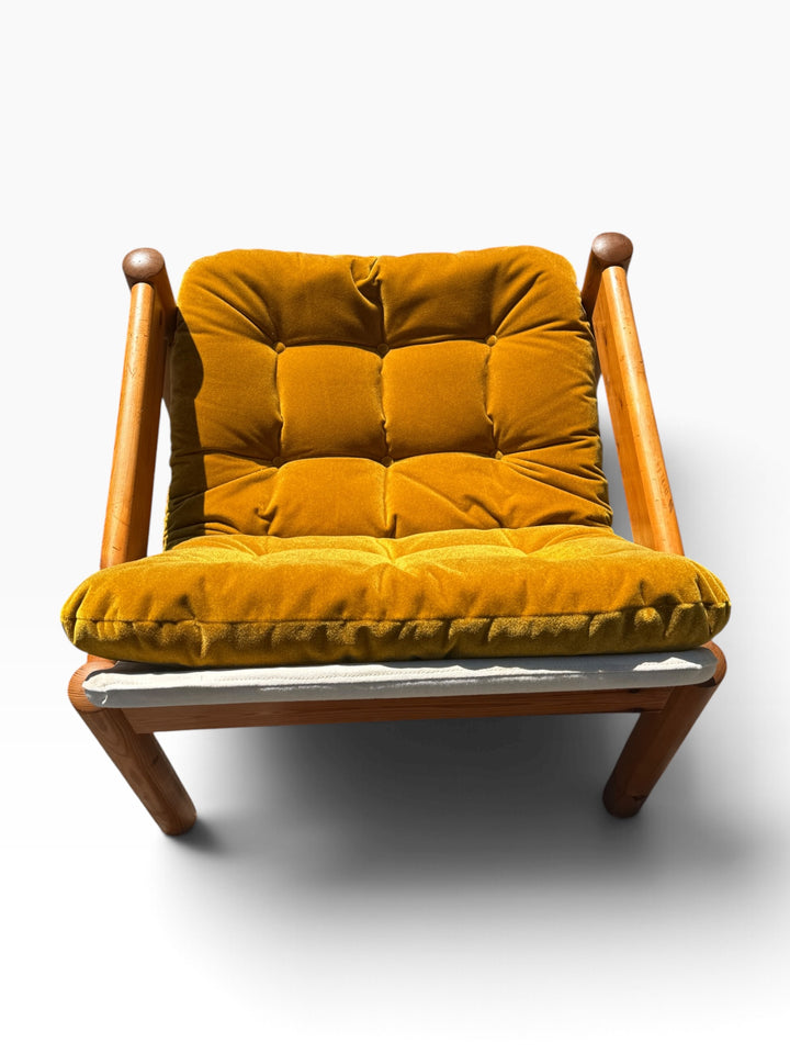 Top-down view of the button-tufted seat and back cushion