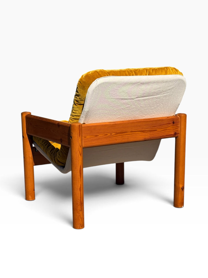 Rear view showing the new natural canvas sling and pine back rail