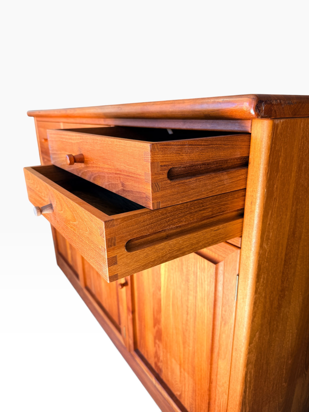 Finger-jointed drawers open, side view