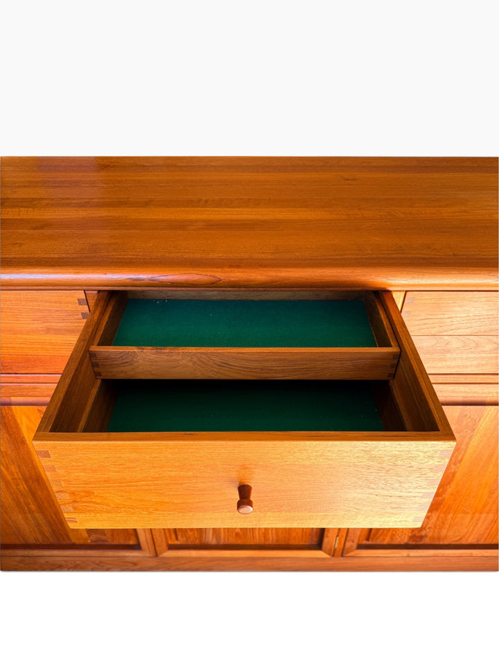 Felt-lined center drawer with sliding tray