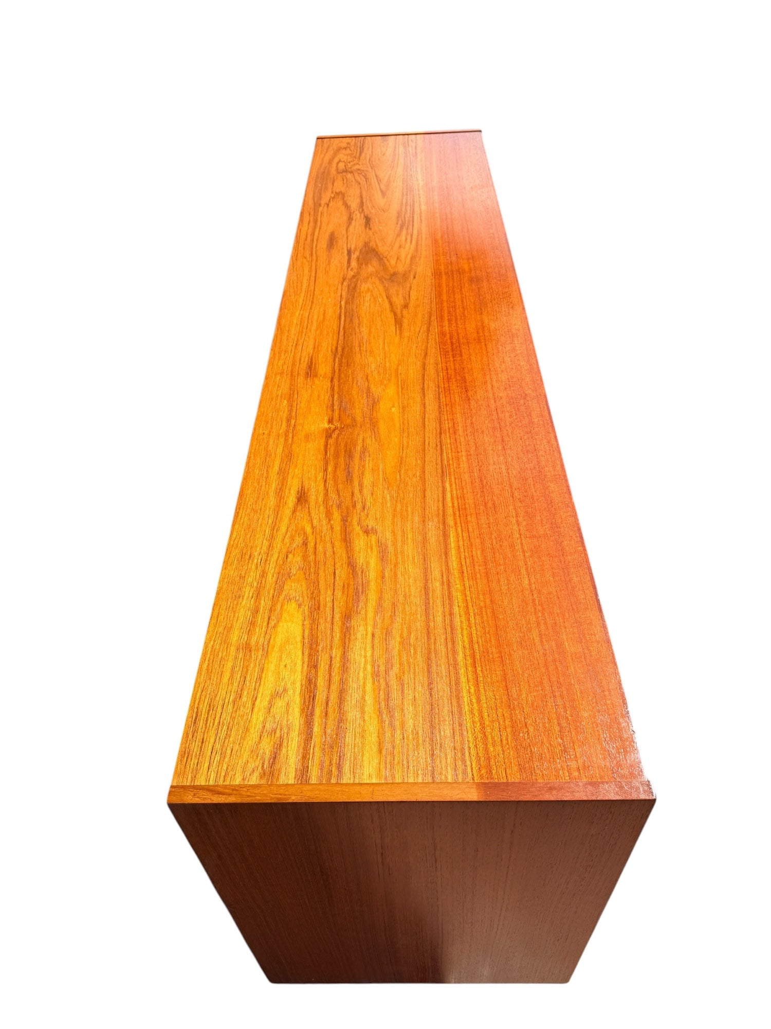 Danish Teak Credenza, top surface showing figured teak grain — front half