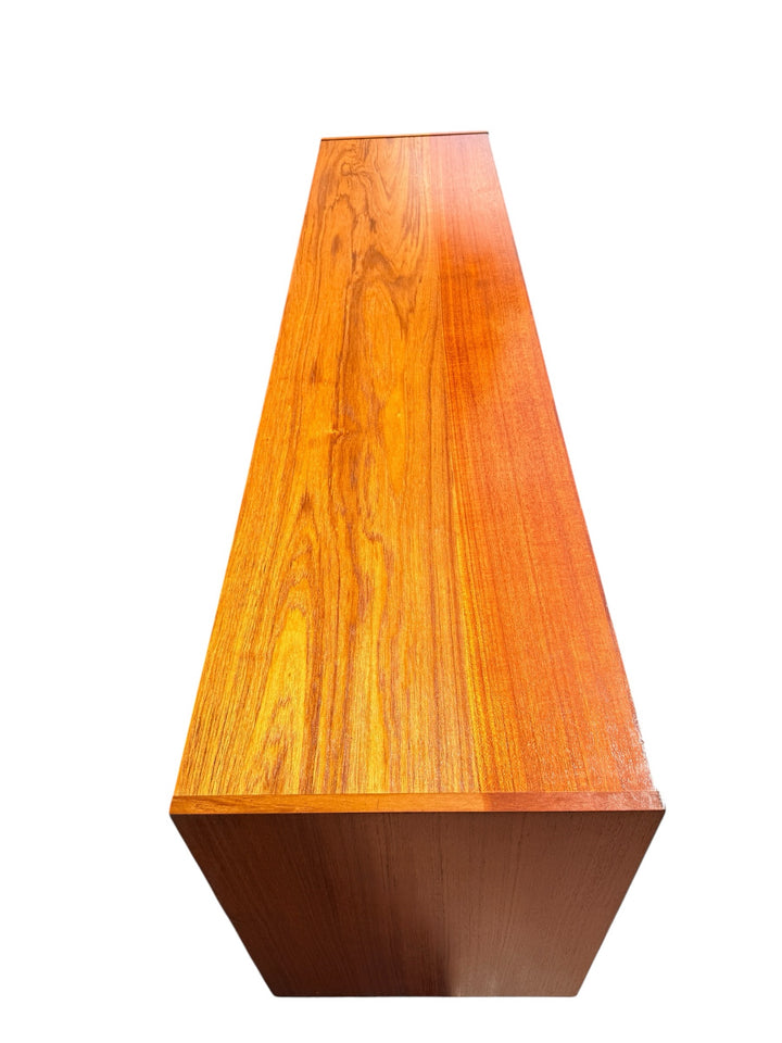 Danish Teak Credenza, top surface showing figured teak grain — front half
