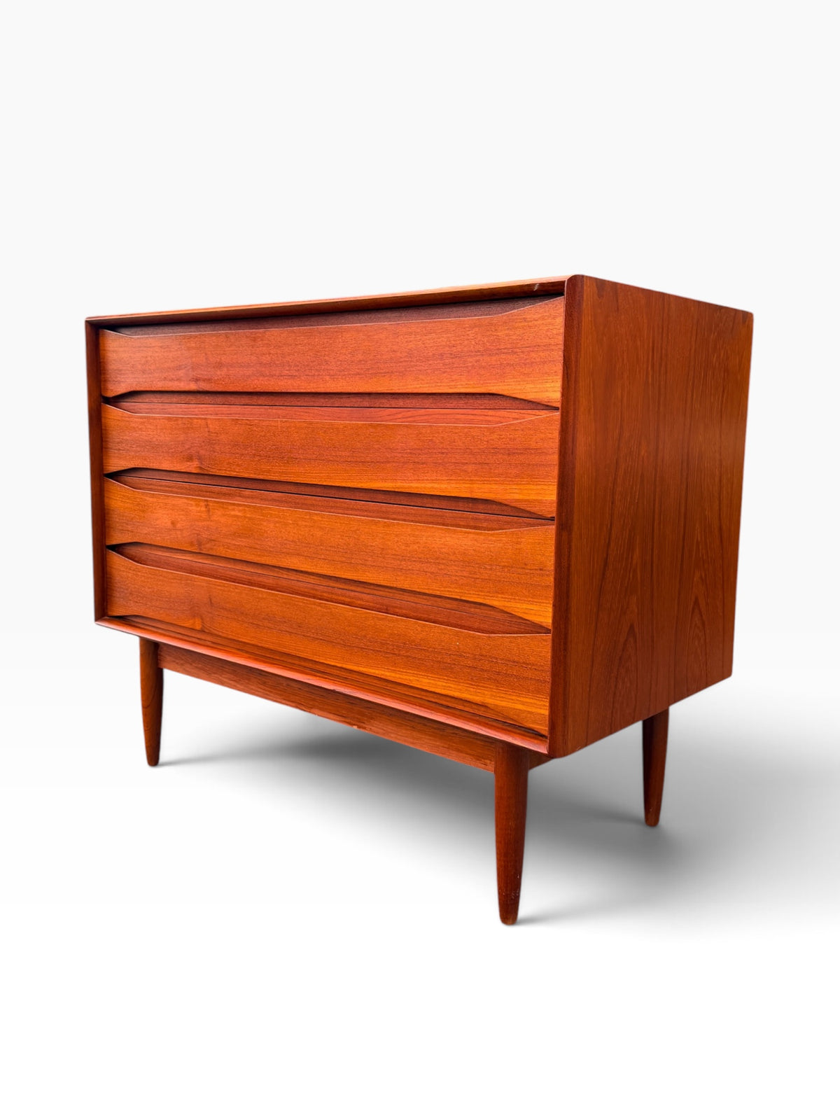 Danish teak dresser, three-quarter angle view
