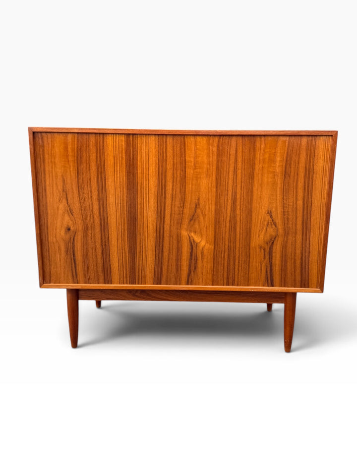Finished book-matched teak back of the dresser