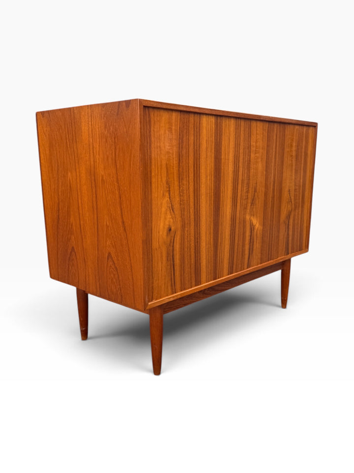 Rear three-quarter view of the teak dresser