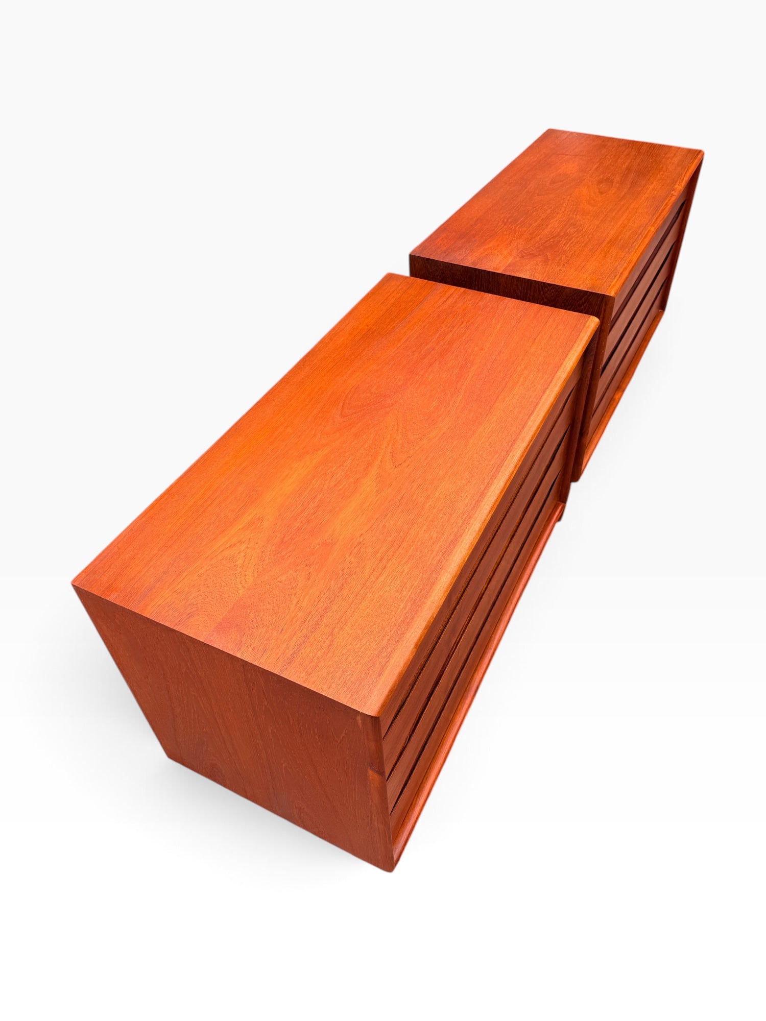 Book-matched teak tops of the pair of Danish dressers, overhead view