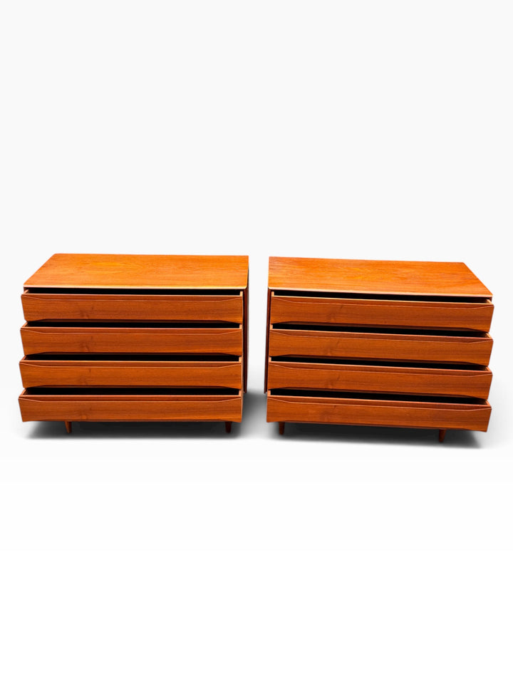 Pair of Danish teak dressers with drawers slightly open