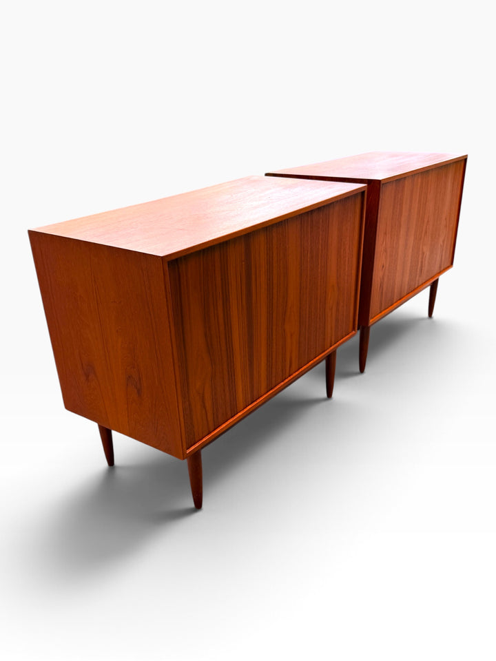 Finished book-matched teak backs of both dressers