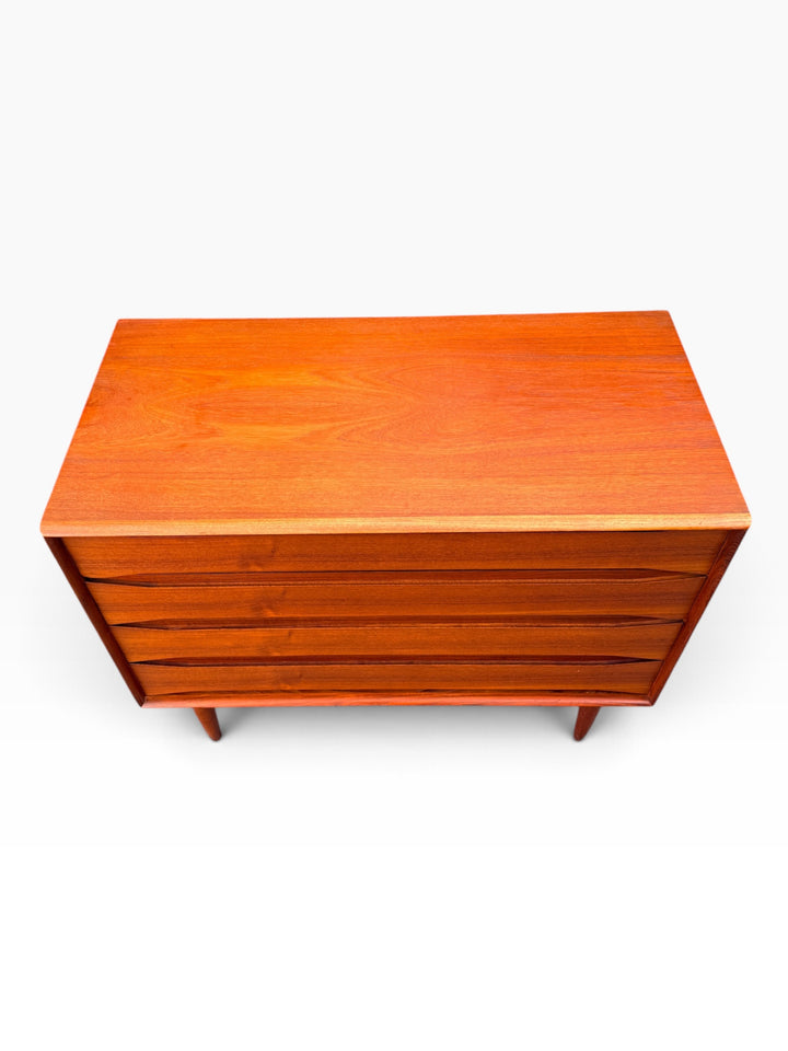 Teak dresser case side showing grain and mitred edge