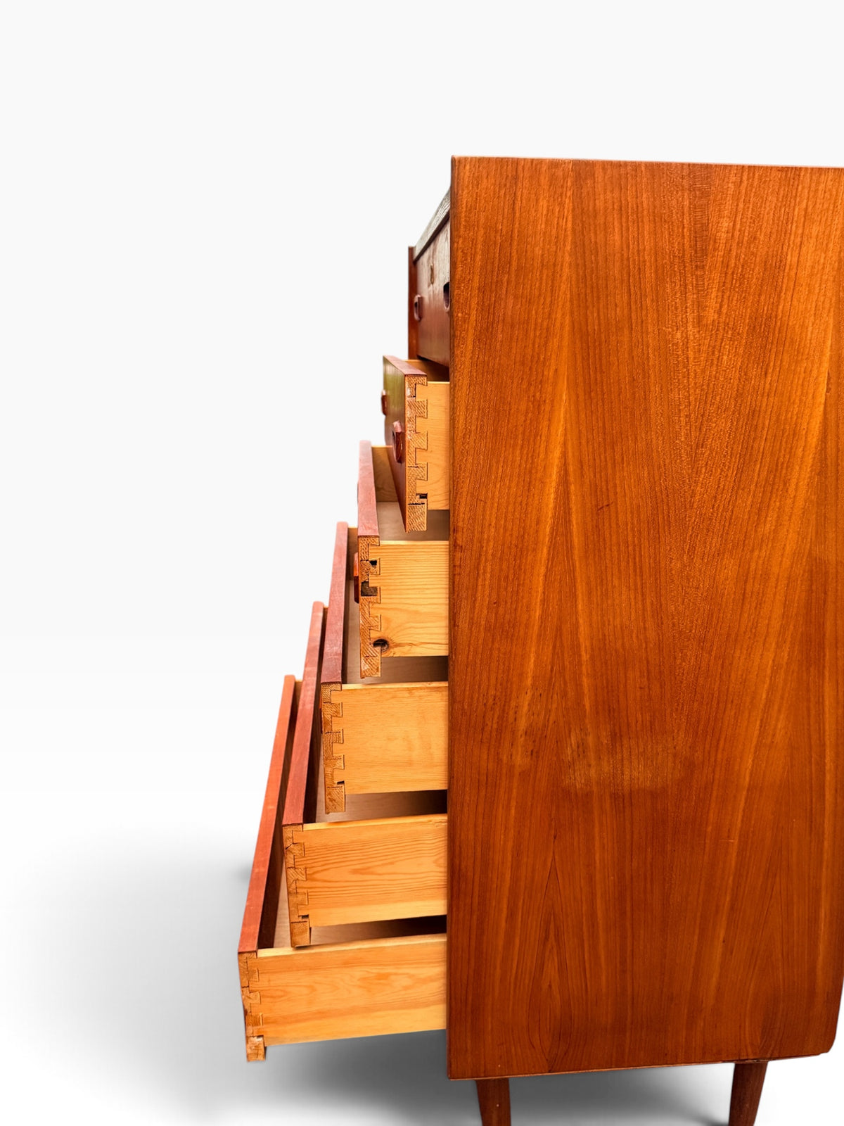 Teak dresser with drawers open, side view