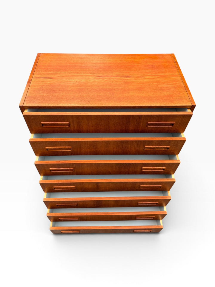 Teak dresser with drawers open, high angle