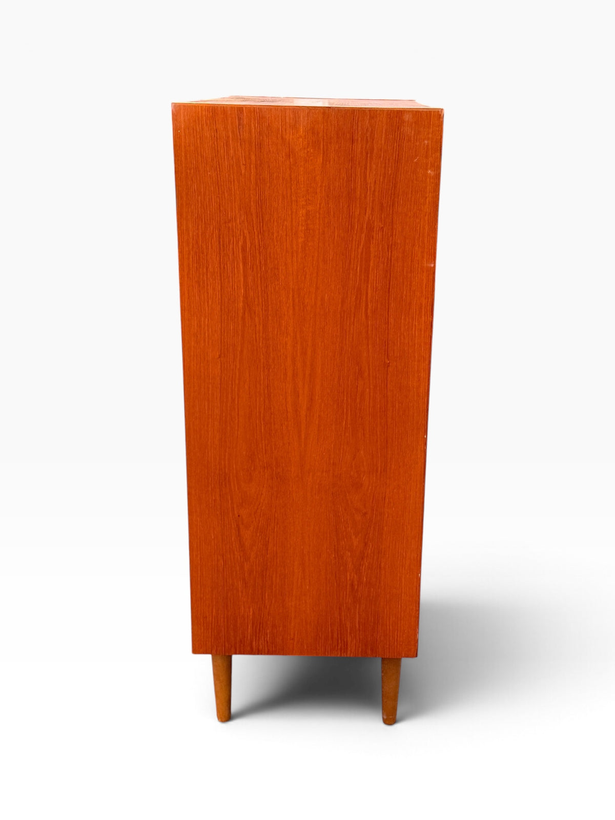 Teak tallboy dresser, side view