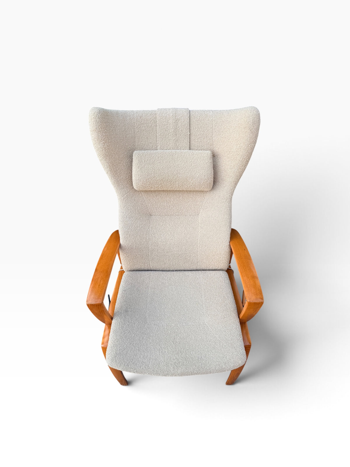 Wingback recliner from above showing seat and headrest pillow