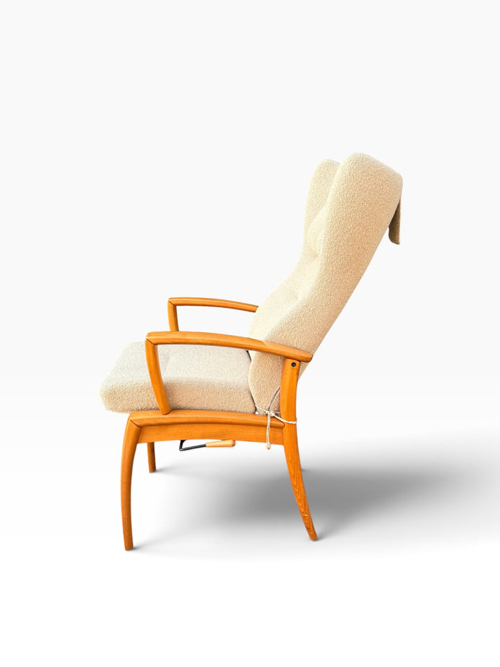 Side profile of Danish wingback recliner