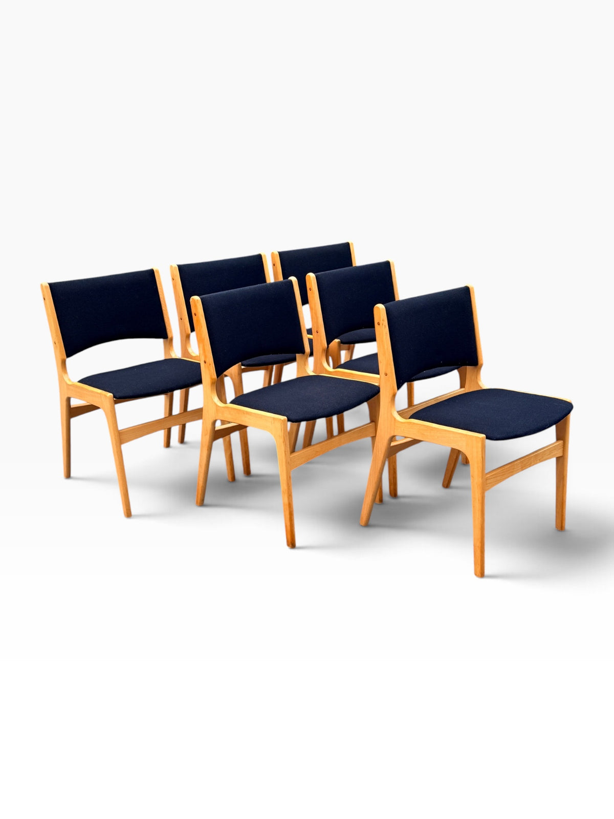 Six beech dining chairs, side group view