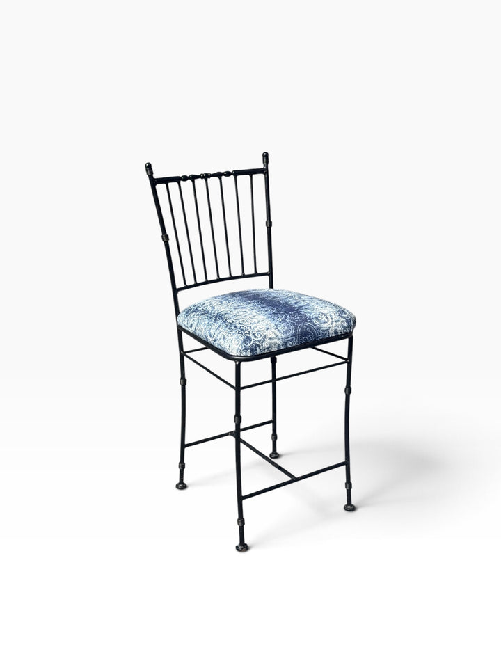 Opposite three-quarter view of the black iron counter stool