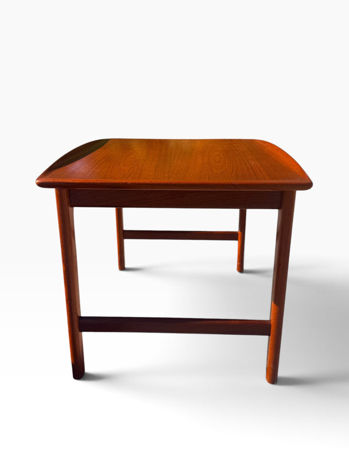 DUX teak end table end view showing splayed legs and stretchers