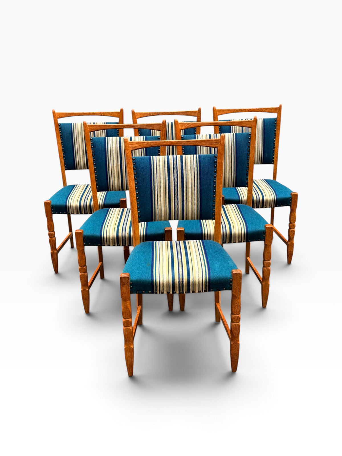 Set of six Henning Kjærnulf oak dining chairs with striped upholstery