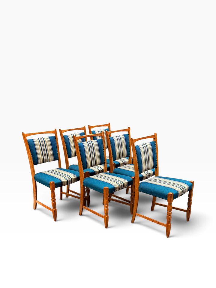 Six Danish oak dining chairs, side group view