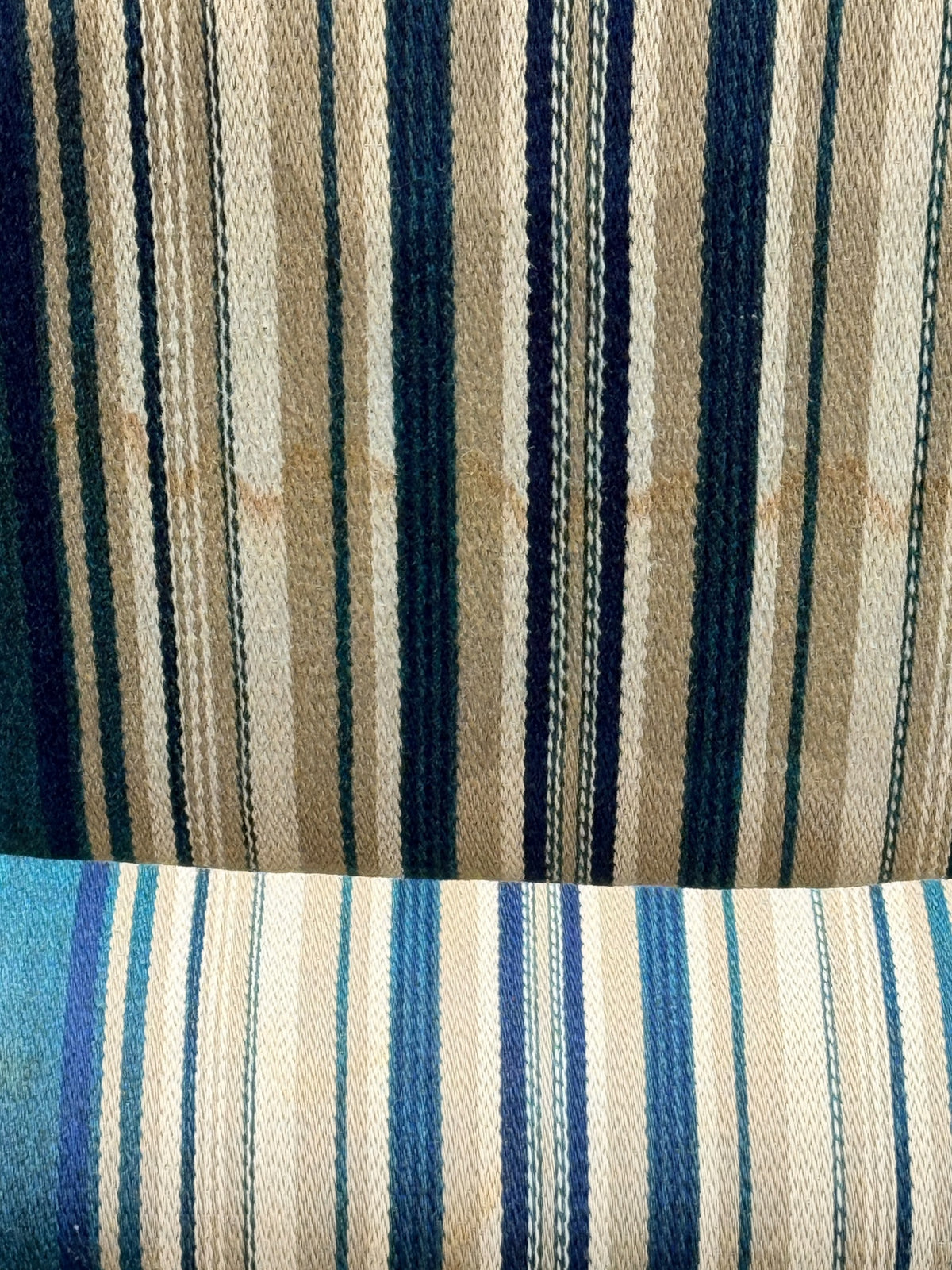 Close-up of minor stain line on one chair back