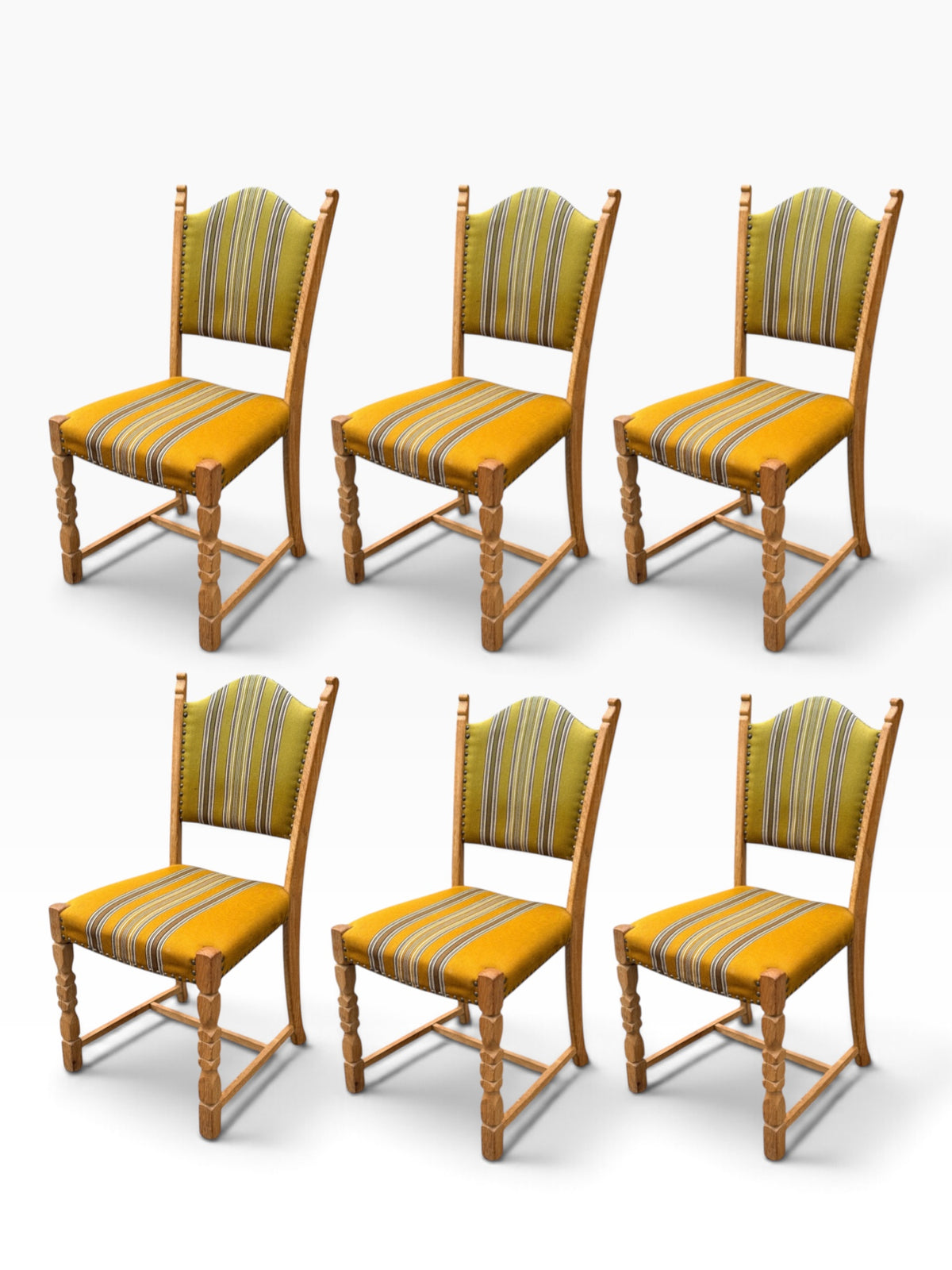 Set of six Henning Kjærnulf oak dining chairs with mustard striped upholstery