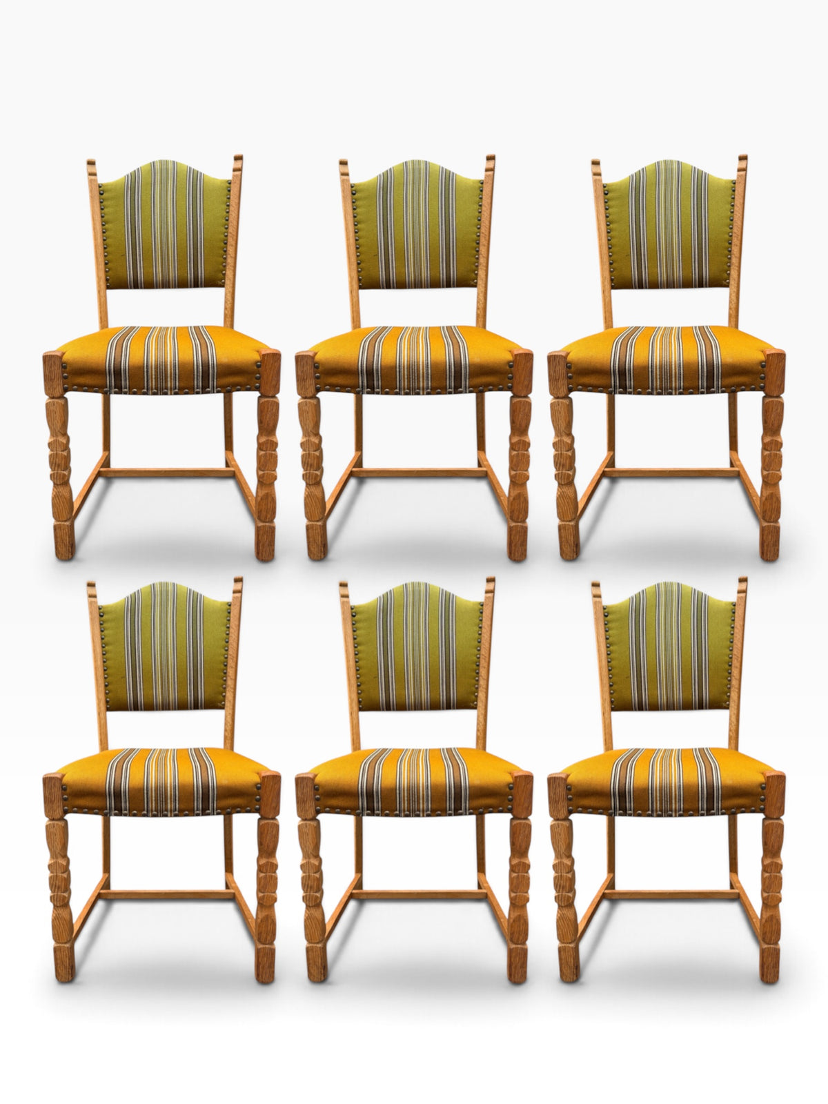 Six Kjærnulf oak dining chairs, front view