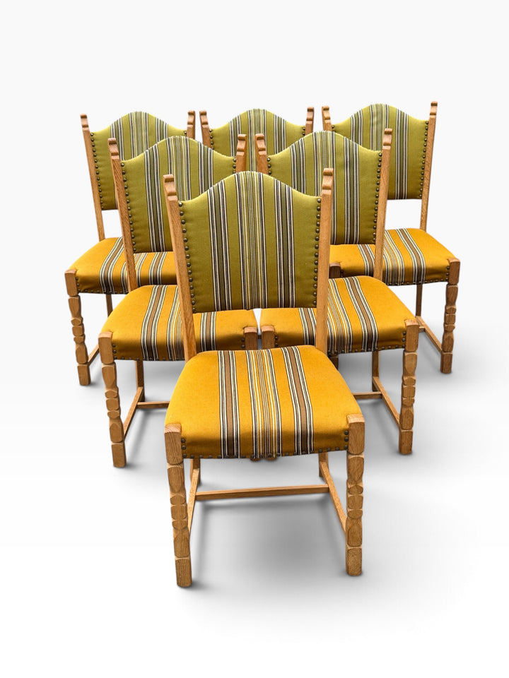 Six Danish oak dining chairs, grouped front view