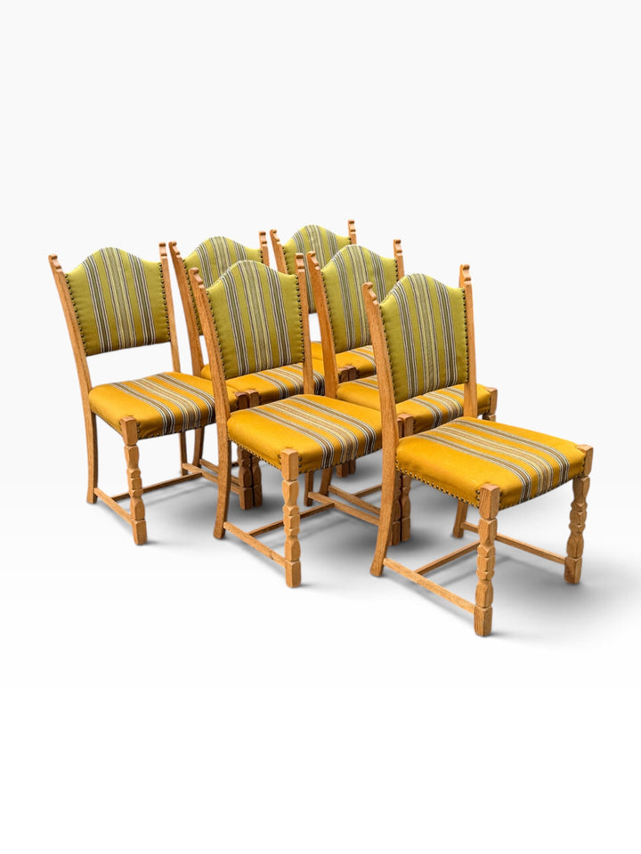 Six oak dining chairs, side group view