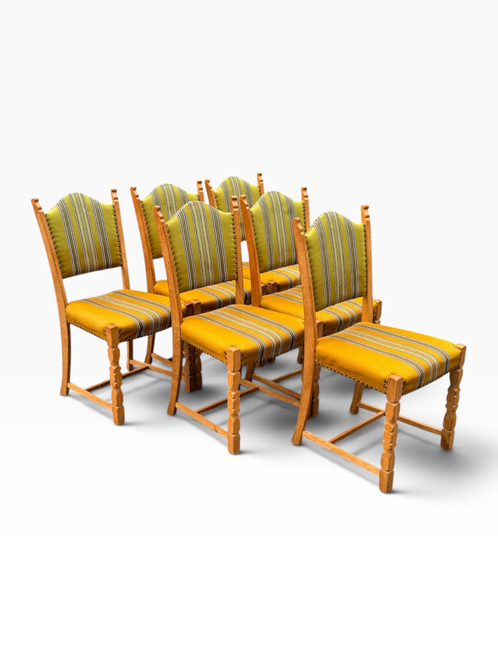 Six Kjærnulf chairs, opposite angled group view