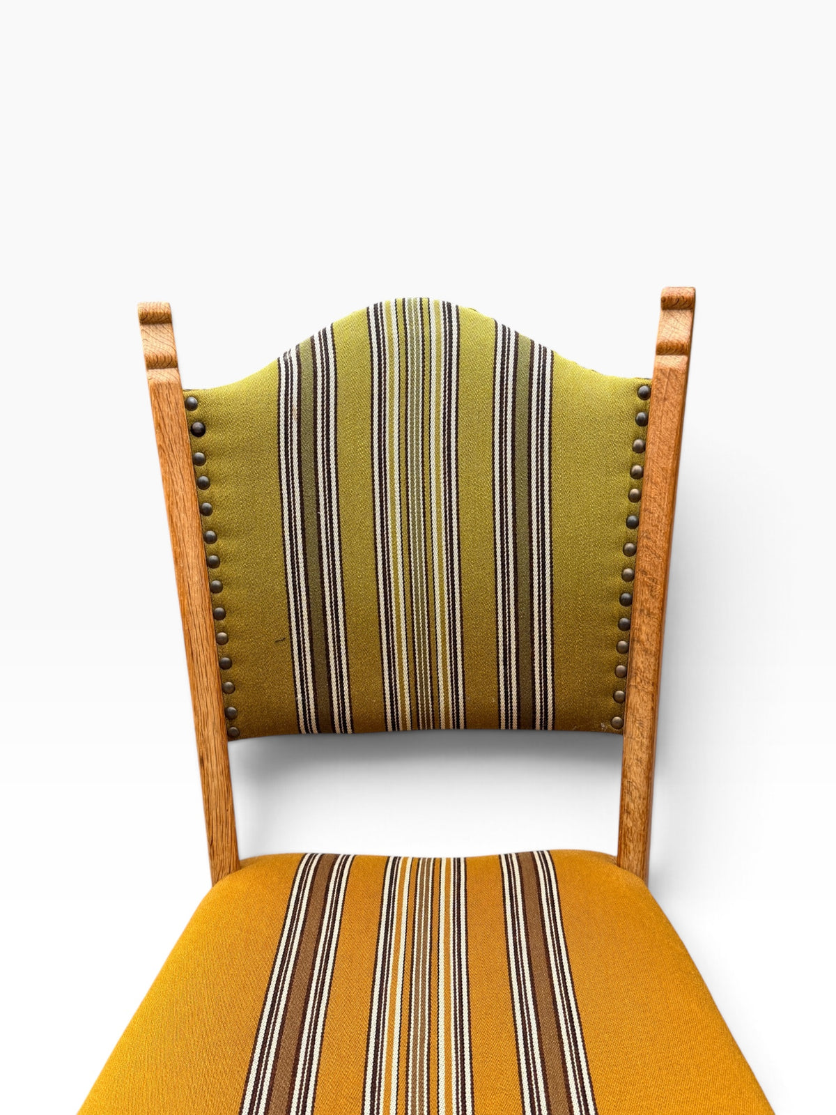 Arched striped backrest with brass nailhead trim