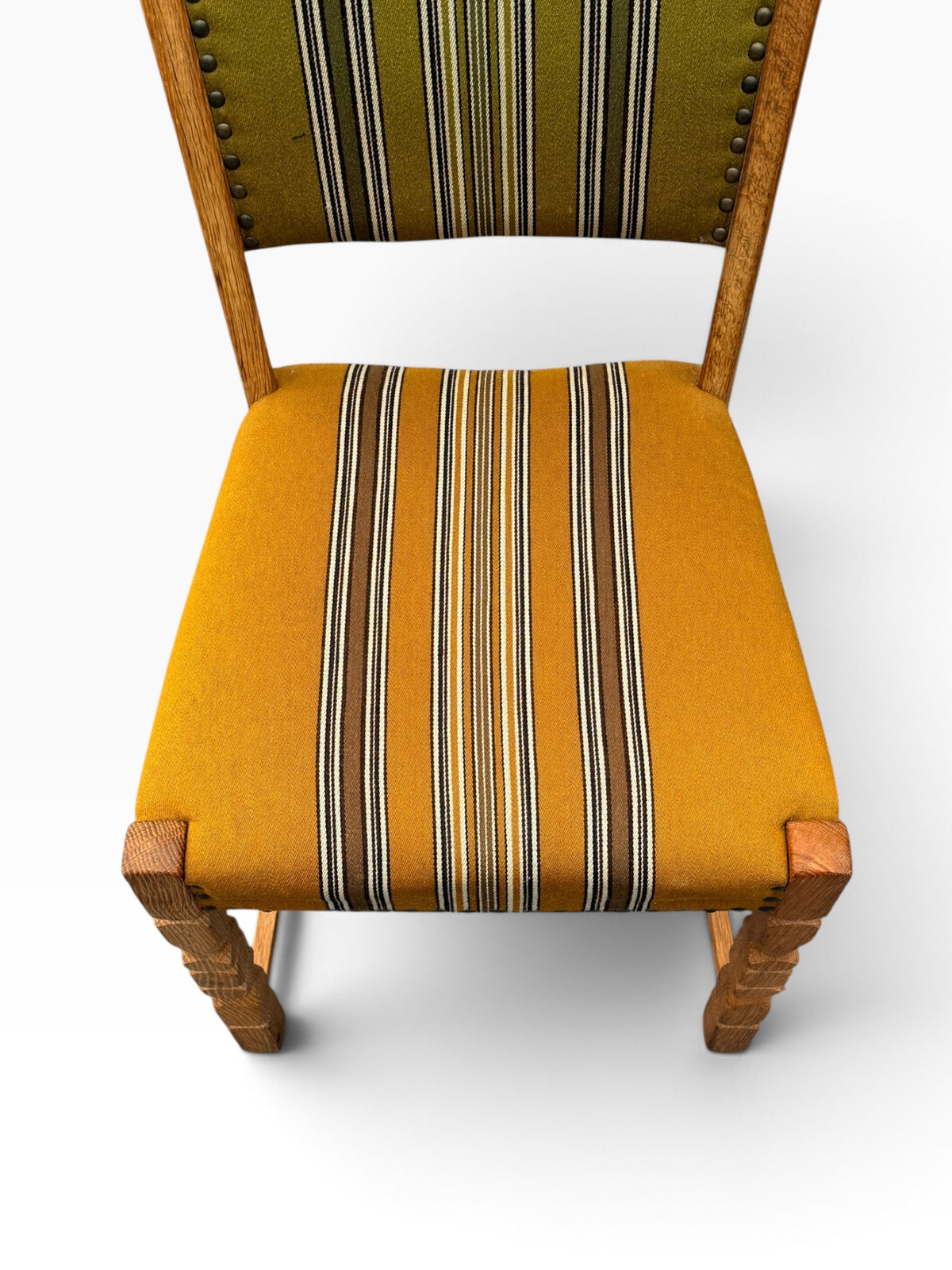 Mustard striped seat and carved front legs