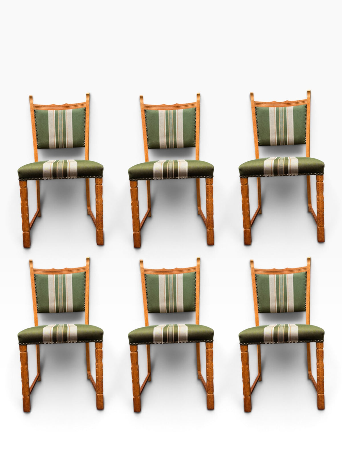 Six Kjærnulf oak dining chairs, front view