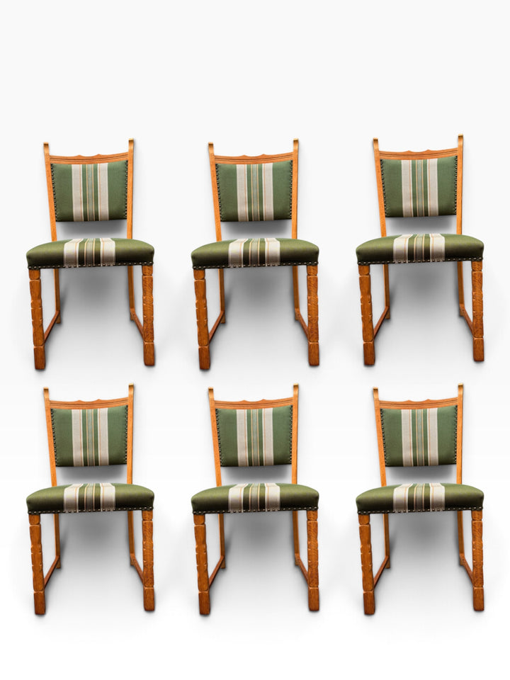Six Kjærnulf oak dining chairs, front view