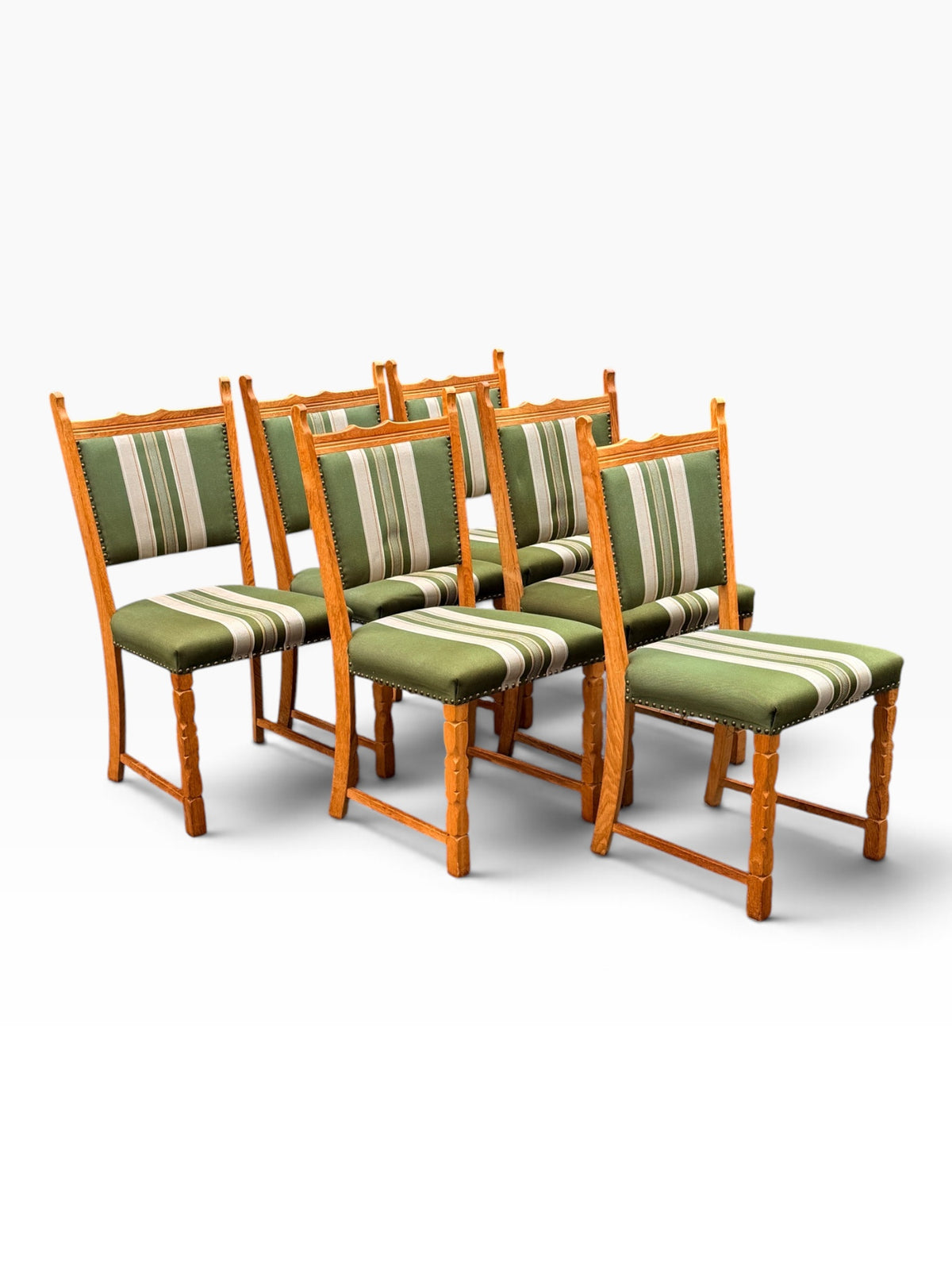 Six Kjærnulf chairs, opposite angled group view